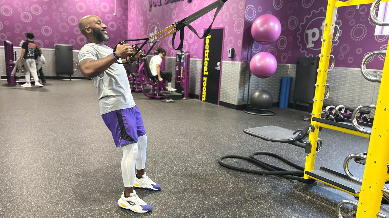 Teddy Savage performing a TRX row