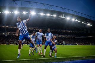 Brighton and Hove Albion celebrate their winning goal against Tottenham