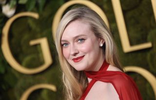 dakota fanning, The “Ripley” nominee stuns in a crimson red lip to match her Dolce & Gabbana gown. The soft and sweet side part is also gorgeous.