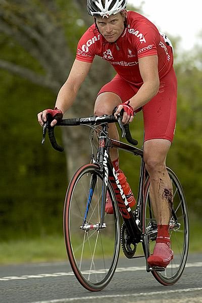 Blood trickles from Stuart Shaw's left knee after a crash earlier in the day.