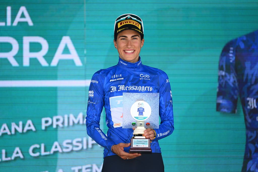 CAGLIARI ITALY JUNE 30 Elisa Balsamo of Italy and Team Trek Segafredo celebrates at podium as blue mountain jersey winner during the 33rd Giro dItalia Donne 2022 Stage 1 a 47km individual time trial stage from Cagliari to Cagliari ITT GiroDonne UCIWWT on June 30 2022 in Cagliari Italy Photo by Dario BelingheriGetty Images