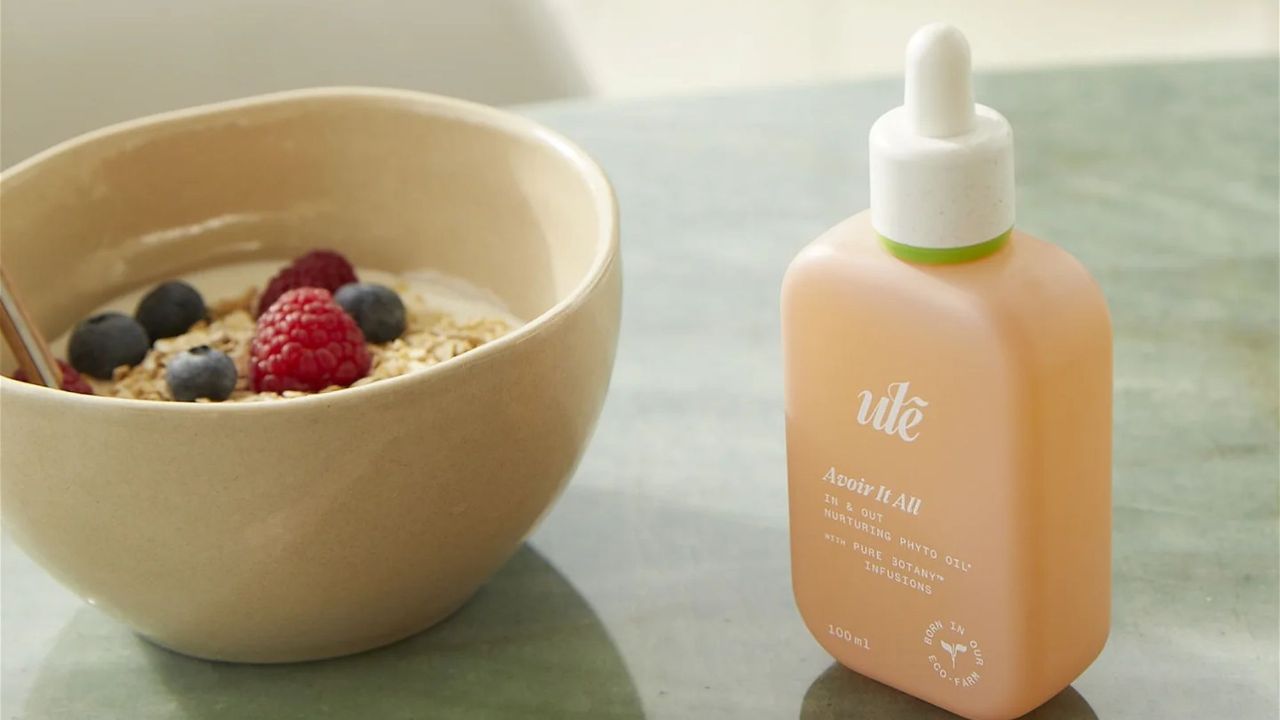 ule skincare oil next to a bowl of porridge