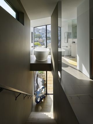 Staircase and bathtub at Steinauer Sawyers Residence