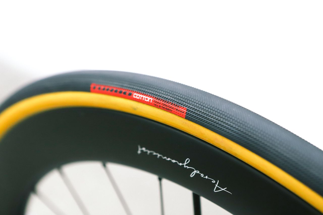 A tan bicycle tyre on a white background