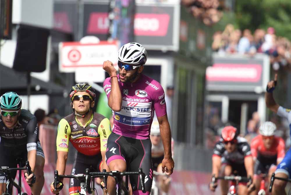 Gaviria kisses his bracelet, a gift from his girlfriend, as he Giro stages become a habit in 2017