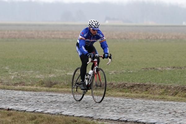 Stijn Devolder on the last cobblestone section of the race: De Lange Munte. Very windy today.