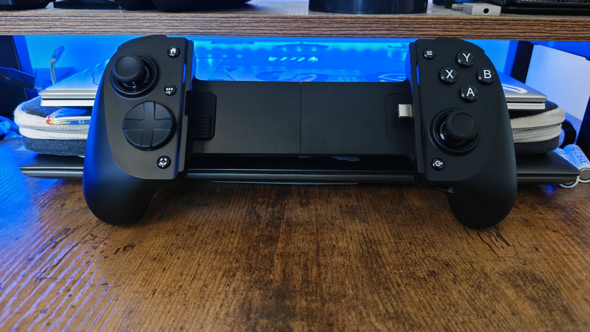 The Razer Kishi V3 Pro in front of blue lighting