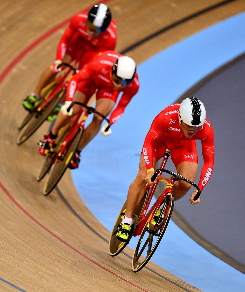 China compete in the Men's Team Sprint qualification round during the UCI Track Cycling World Championships