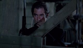 License To Kill Timothy Dalton prepares to take a shot from cover