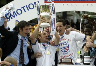 Rushden &amp; Diamonds lift the trophy after winning the 2002/03 Division 3 title