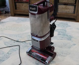 Vacuuming a carpet with the Shark Rotator Pet Lift-Away Upright Vacuum