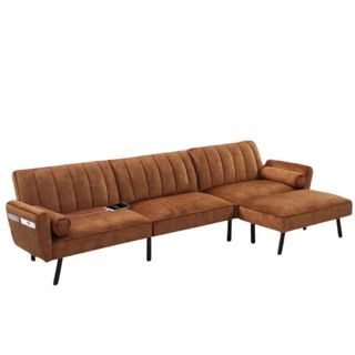 A caramel colored velvet L-shaped couch