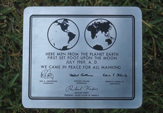 A photograph of the plaque sent to the moon using the font Futura.