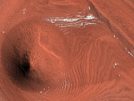 Impact Crater Exhumed from Mars Ice