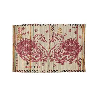 rug with two pink swans