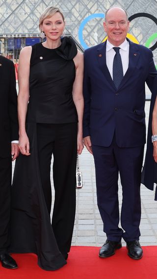 Princess Charlene and Prince Albert of Monaco attend the IOC & Elysee Dinner at the Louvre ahead of the Paris 2024 Olympic Opening Ceremony