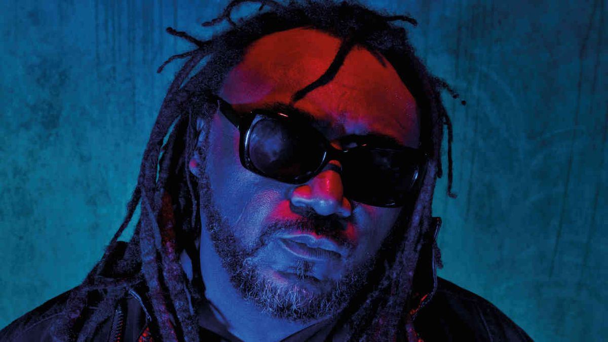 Skindred/Dub War singer Benji Webbe against a blue background