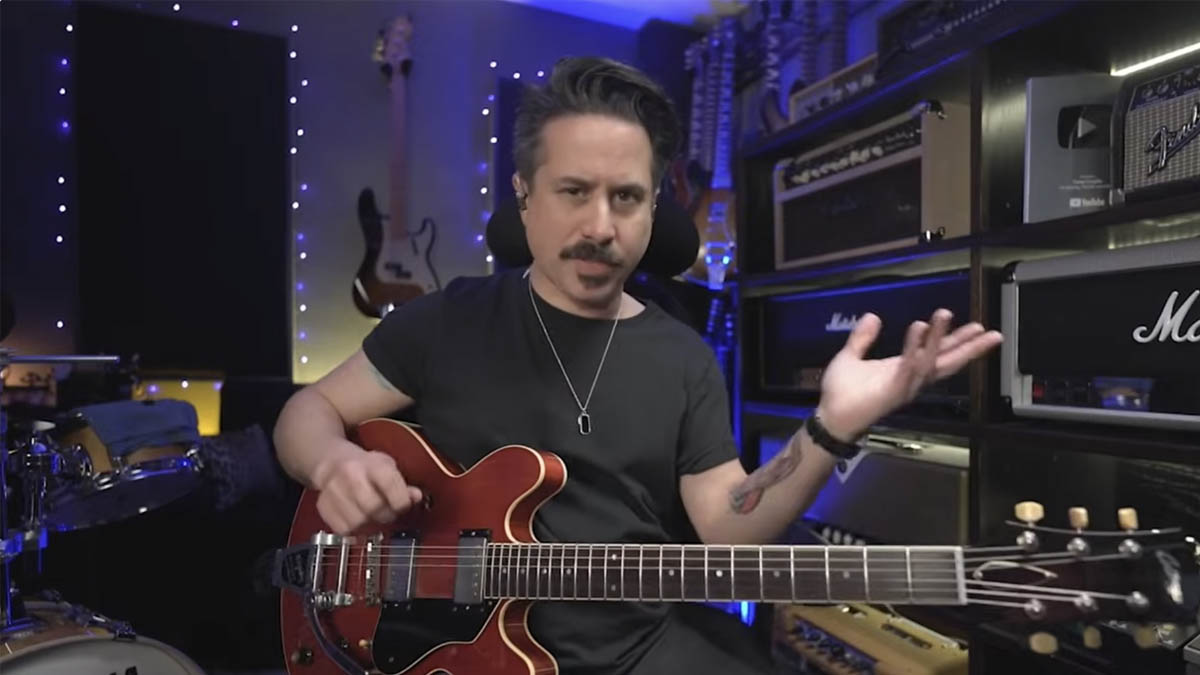 A still from Corey Congilio's Guitar World video lesson in using dominant 7 chords in blues solos.