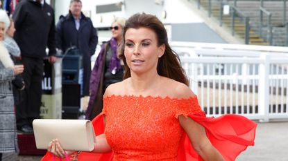 Coleen Rooney attends day 1 'Grand Opening Day' of the Crabbie's Grand National Festival at Aintree Racecourse on April 7, 2016 in Liverpool, England.