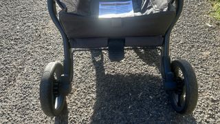 a photo of the brake on the Ergobaby Metro+ Deluxe Stroller