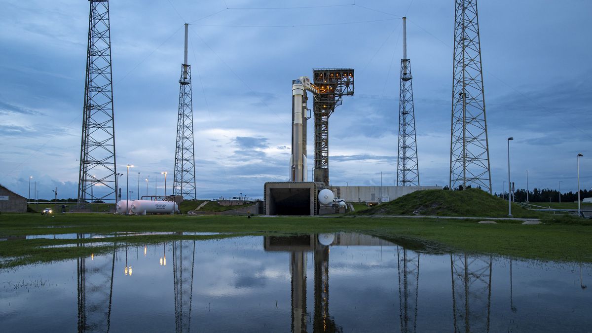 The United Launch Alliance Atlas V rocket and Boeing&#039;s Starliner spacecraft sit on Space Launch Complex 41 at Cape Canaveral Space Force Station at sunset, on Aug. 2, 2021.