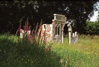 recreated stone built folly in a large garden