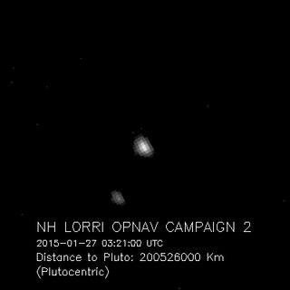 Pluto and Charon, the largest of Pluto's five known moons, were seen Jan. 27, 2015, by the telescopic Long-Range Reconnaissance Imager (LORRI) on NASA's New Horizons spacecraft.