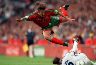 Czech Republic defender Radoslav Latal clatters into Portugal's Dimas Teixeira in the team's Euro 96 quarter-final.