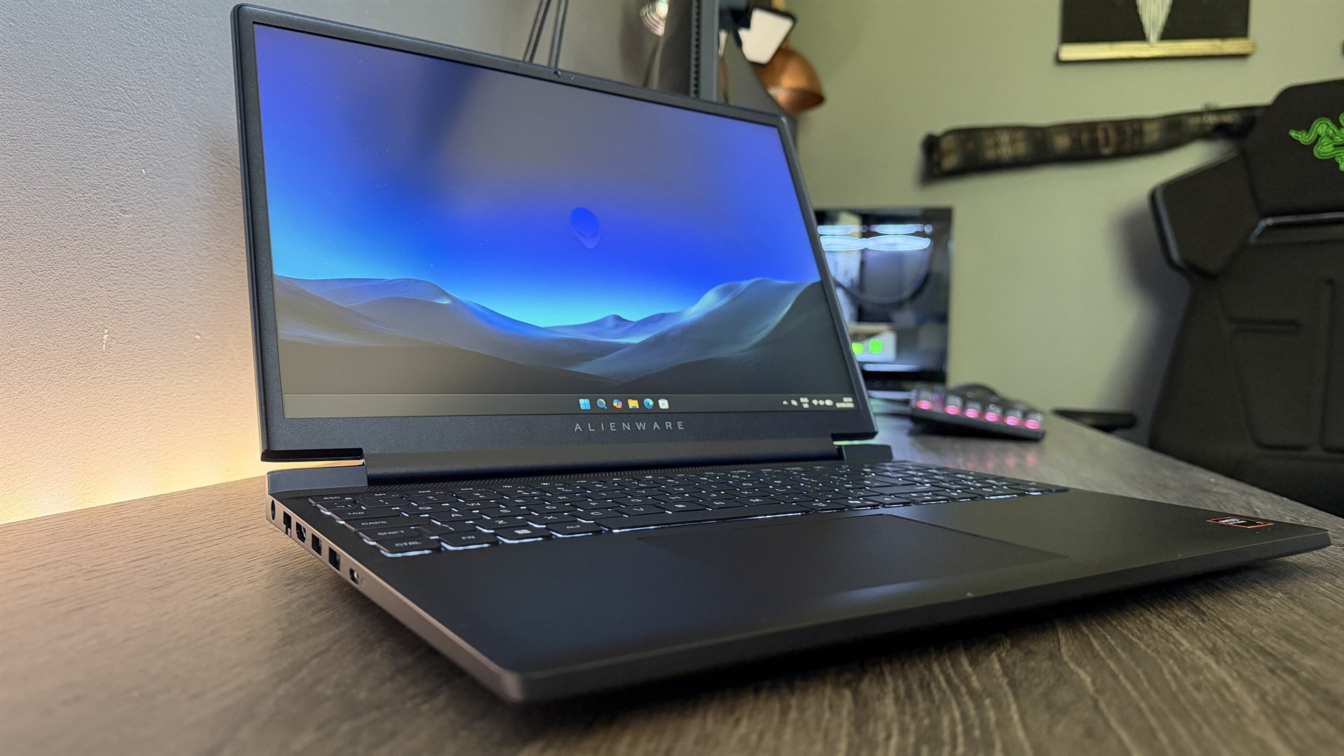 Alienware 15 (2026) gaming laptop on a wooden desk