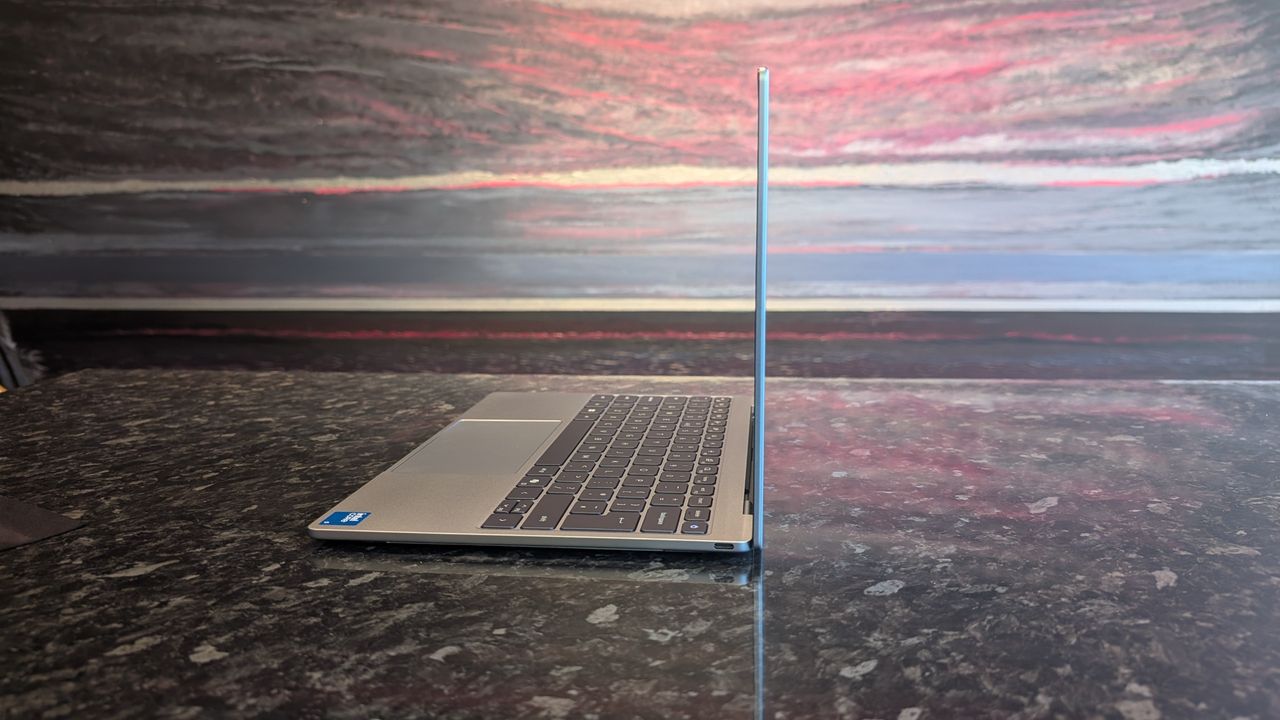 The Dell XPS 13 (2026) laptop pictured on a black marble worktop.