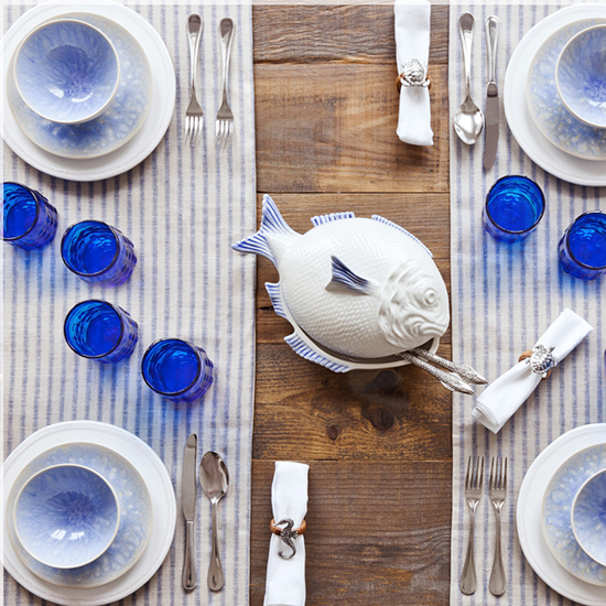 teal stone tableware with bowl and blue tumblers