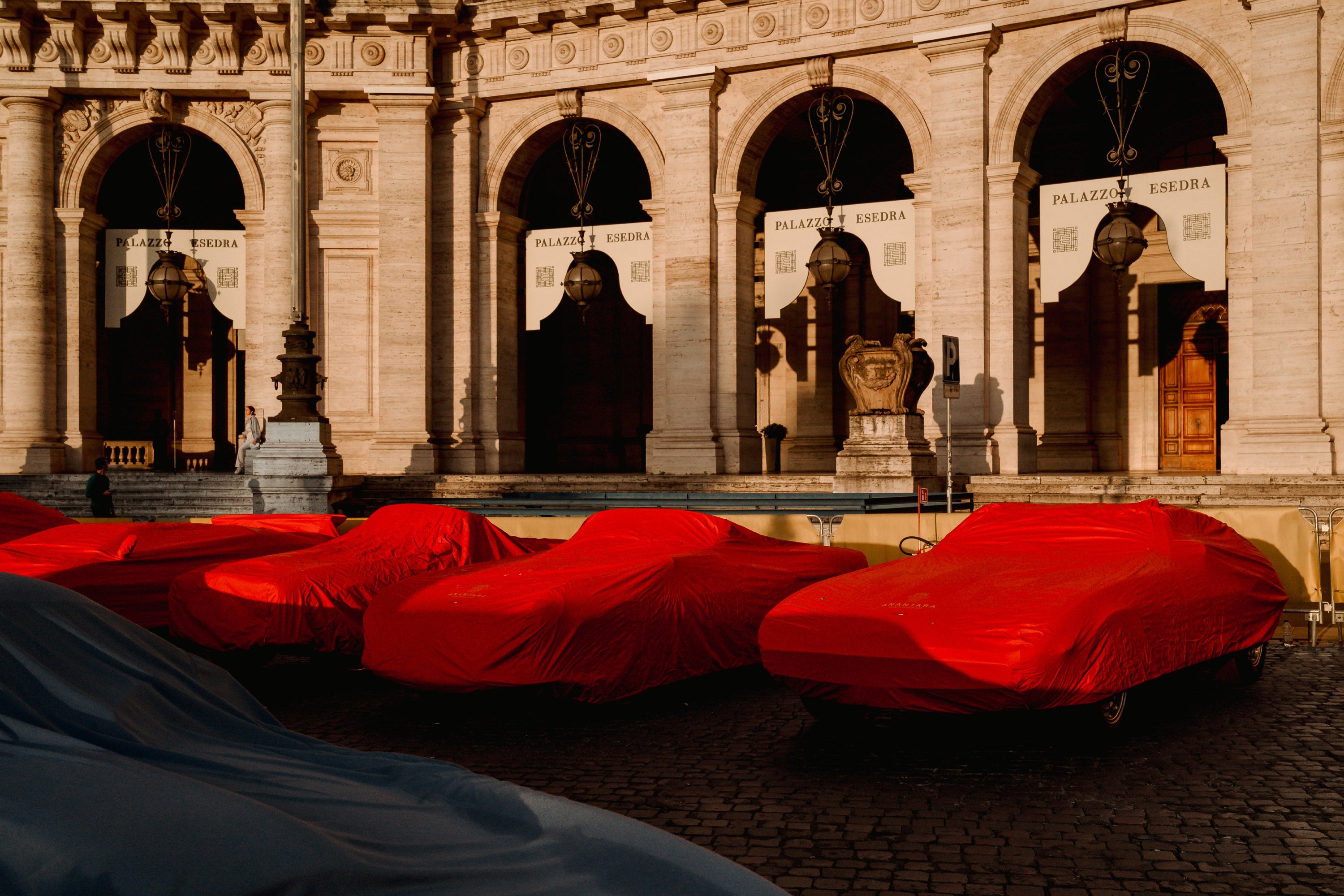 Covered cars await the day outside the Anantara Palazzo Naiadi hotel