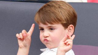 Prince Louis gestures with his hands as he attends the Platinum Pageant on The Mall on June 5, 2022 in London, England.