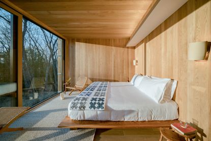 Bedroom with floor to ceiling window