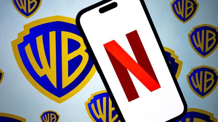 ANKARA, TURKIYE - DECEMBER 5: In this photo illustration, the logo of Netflix is displayed on a mobile phone screen in front of the logo of Warner Bros in Ankara, Turkiye on December 5, 2025. (Photo by Didem Mente/Anadolu via Getty Images)