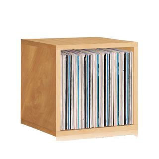 A square wooden storage unit with record sleeves inside of it