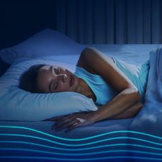 A woman sleeping on a Tempur-Pedic mattress