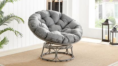 Grey rattan cushioned moon chair