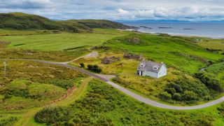 Knocknafenaig house surrounded by land