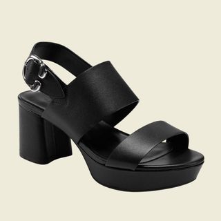 flat lay image of black heel sandals