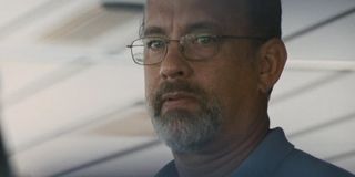 Captain Phillips (Tom Hanks) looks wary in a scene from the movie.
