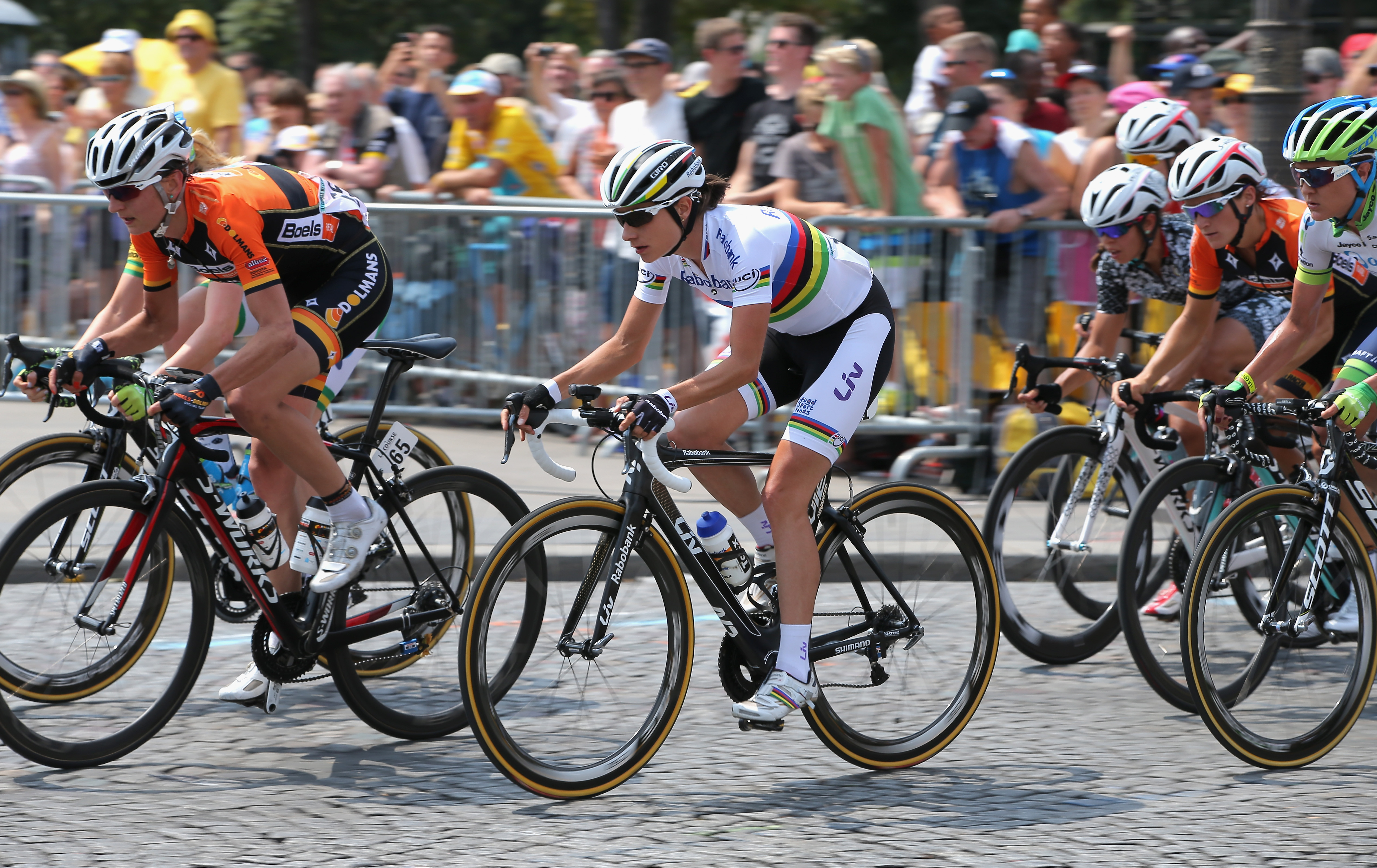 Marianne Vos racing in the rainbow jersey as world champion