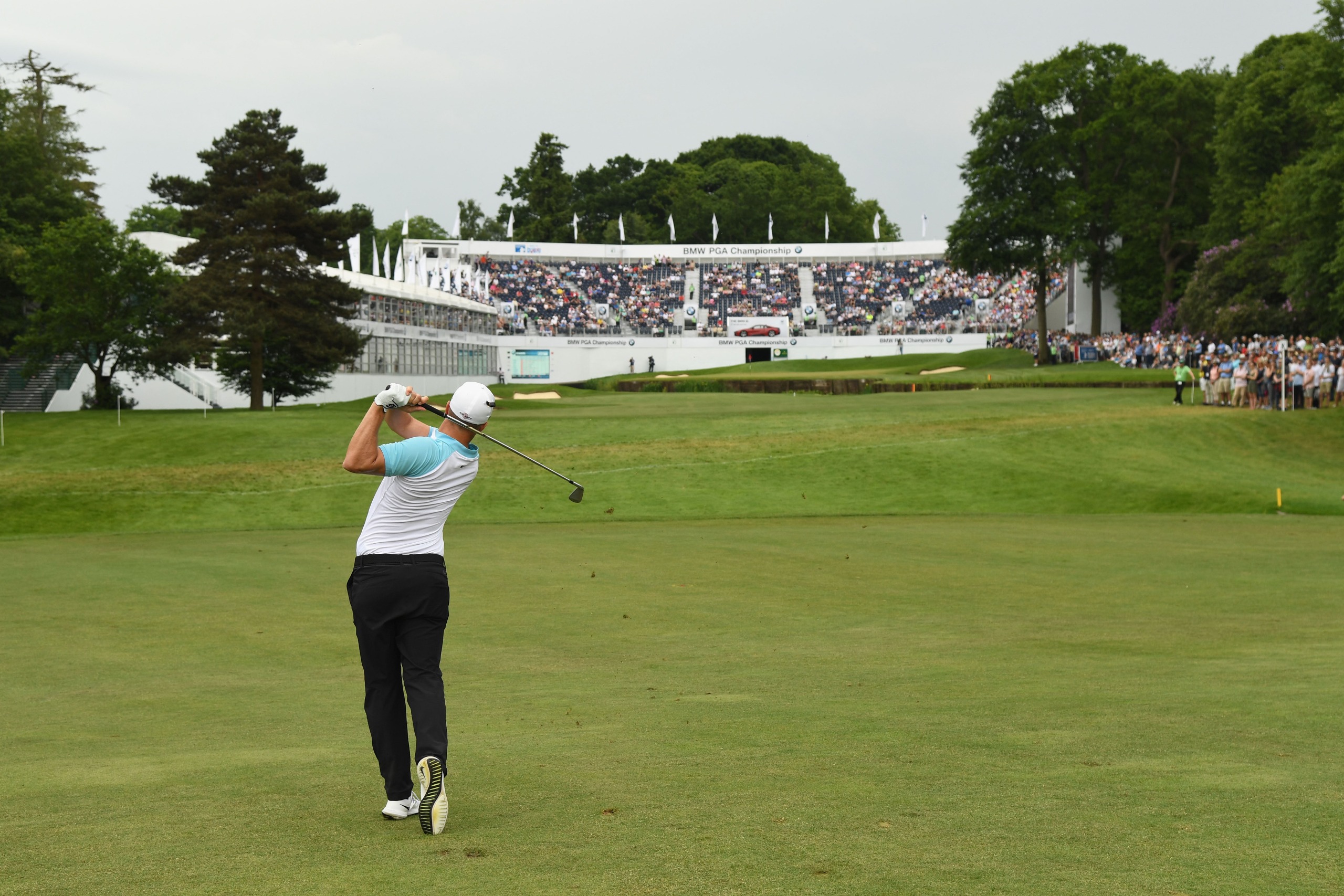 Alex Noren holds his finish on his 2nd shot to the 18th at the 2017 BMW PGA Championship