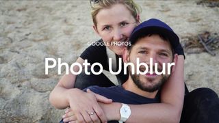 Two people lying on a beach