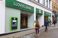 Lloyds Bank logo and ATM outside bank branch