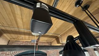 A Yamaha UC VSP-2 hangs in the ceiling for sound masking. 