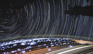 In this photo from the International Space Station, star trails circle above the Earth while bright lightning flashes and city lights illuminate the planet's surface and skies. The image is a composite that combines more than 400 photos captured by NASA astronaut Christina Koch over the span of 11 minutes, when the space station was traveling from Namibia toward the Red Sea.
