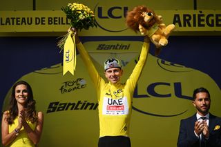 PLATEAU DE BEILLE FRANCE JULY 14 Tadej Pogacar of Slovenia and UAE Team Emirates celebrates at podium as Yellow Leader Jersey winner during the 111th Tour de France 2024 Stage 15 a 1977km stage from Loudenvielle to Plateau de Beille 1782m UCIWT on July 14 2024 in Plateau de Beille France Photo by Dario BelingheriGetty Images