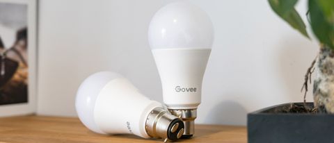 the Govee Wi-Fi LED Bulb comes in a twin pack - both bulbs seen here on a wooden shelf