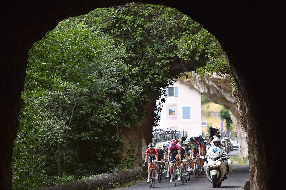 Bob Jungels leads the breakaway through a short tunnel.